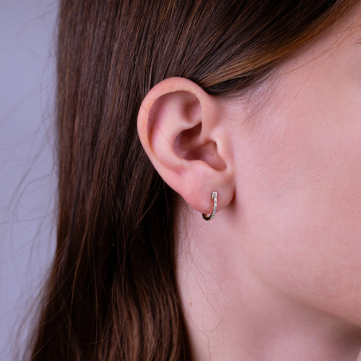 10K White Gold Diamond Huggie Earrings by ORLY Jewellers